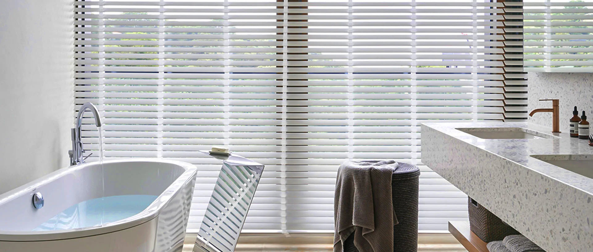 Traditional venetian blinds with adjustable slats for precise light and privacy control.